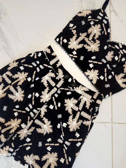 Set negro bordado dorado