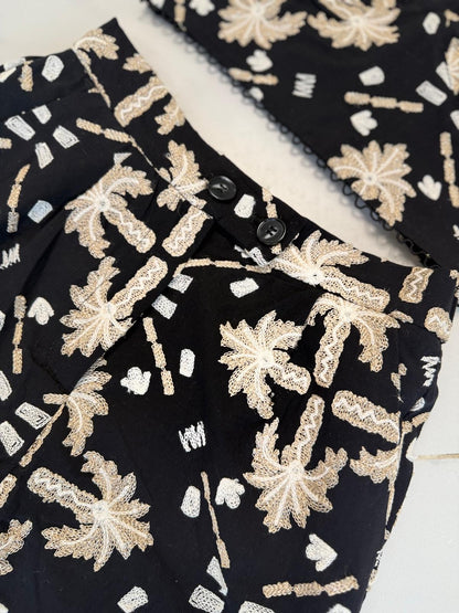 Set negro bordado dorado